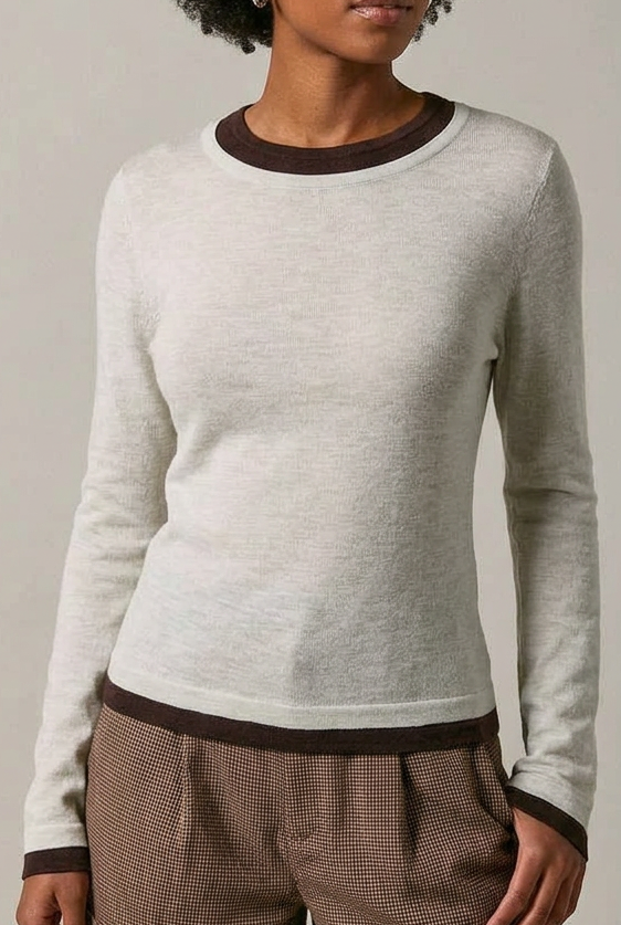 Model wearing a blue and brown double layer sweater top