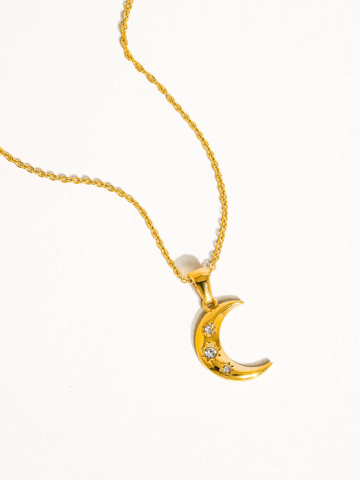 18K Gold Plating, CZ Stones Stainless Steel Pendant Size (inch): 6.5 Chain Length (inch): 16 Extension Length (inch): 2 Lead-free, Nickel-safe Hypoallergenic Water Resistant