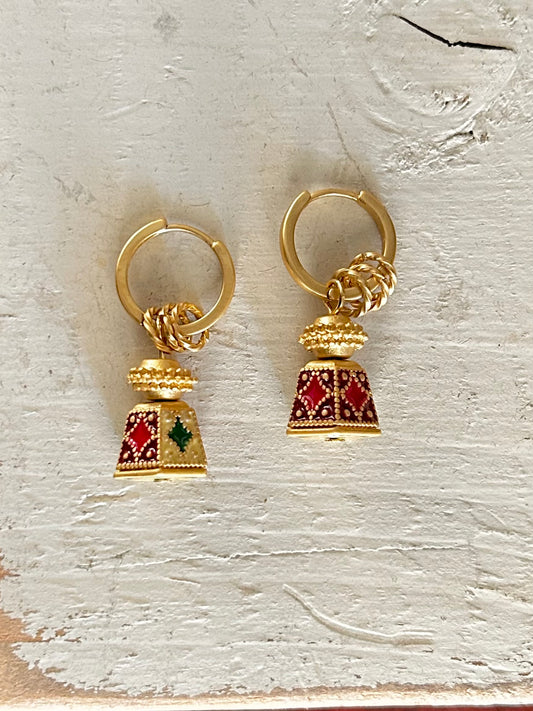 Pair of gold earrings with red and green gemstones on a textured white surface

18K Gold Plating

Oily Droplets

Brass Measurement (L x W inch): 1.3 x 0.6

Nickel-free, Lead-safe